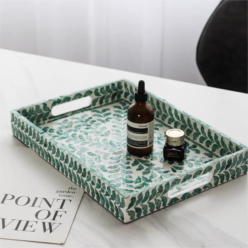 Decorative shell craft product tray with natural shell mosaic surface, stylish rectangular tray for vanity, coffee table, or jewelry display.