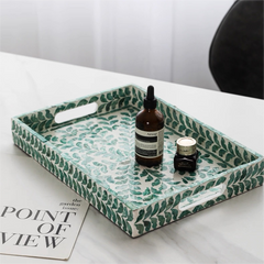 Decorative shell craft product tray with natural shell mosaic surface, stylish rectangular tray for vanity, coffee table, or jewelry display.