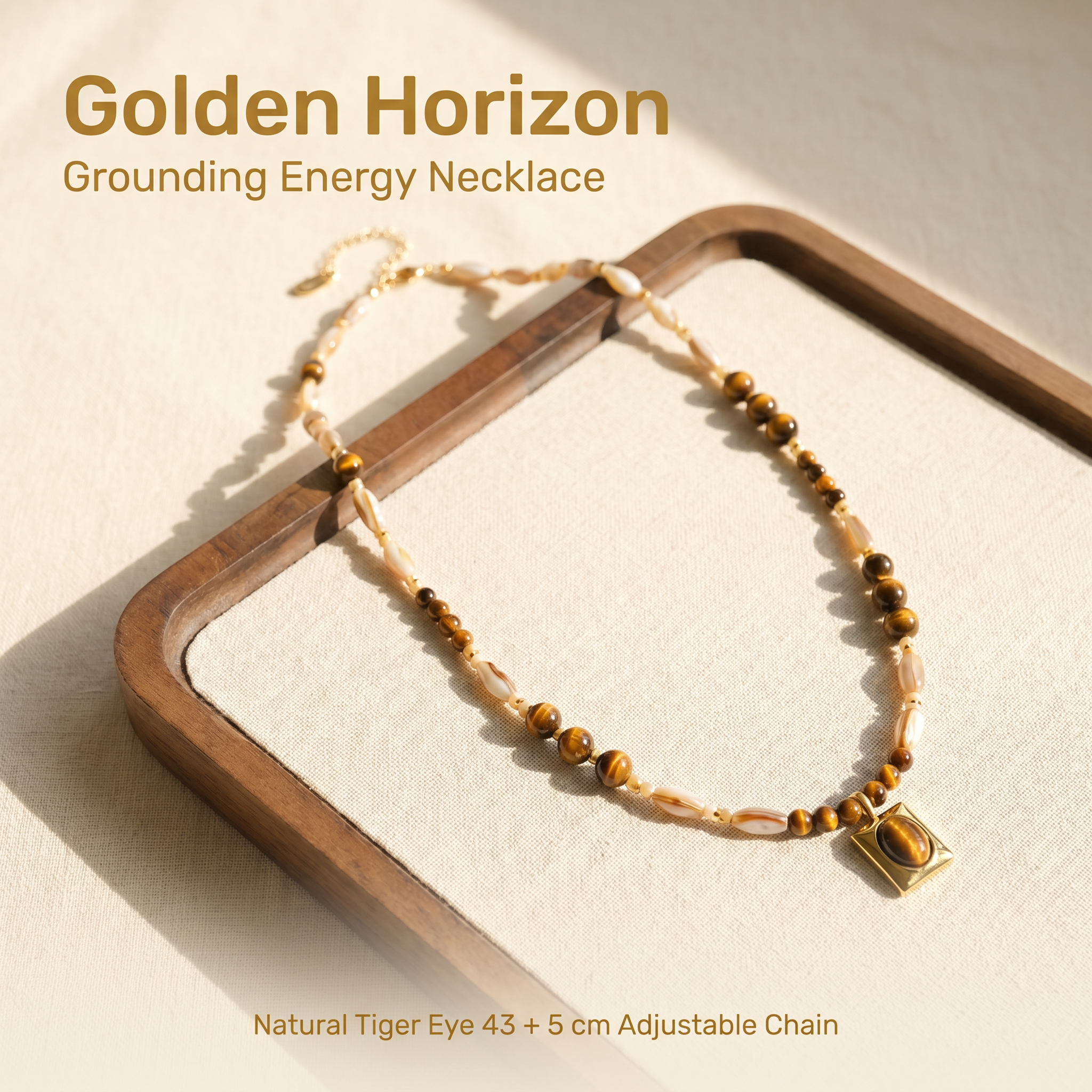 Golden Horizon tiger eye crystal necklace hero image with neutral earth tone styling