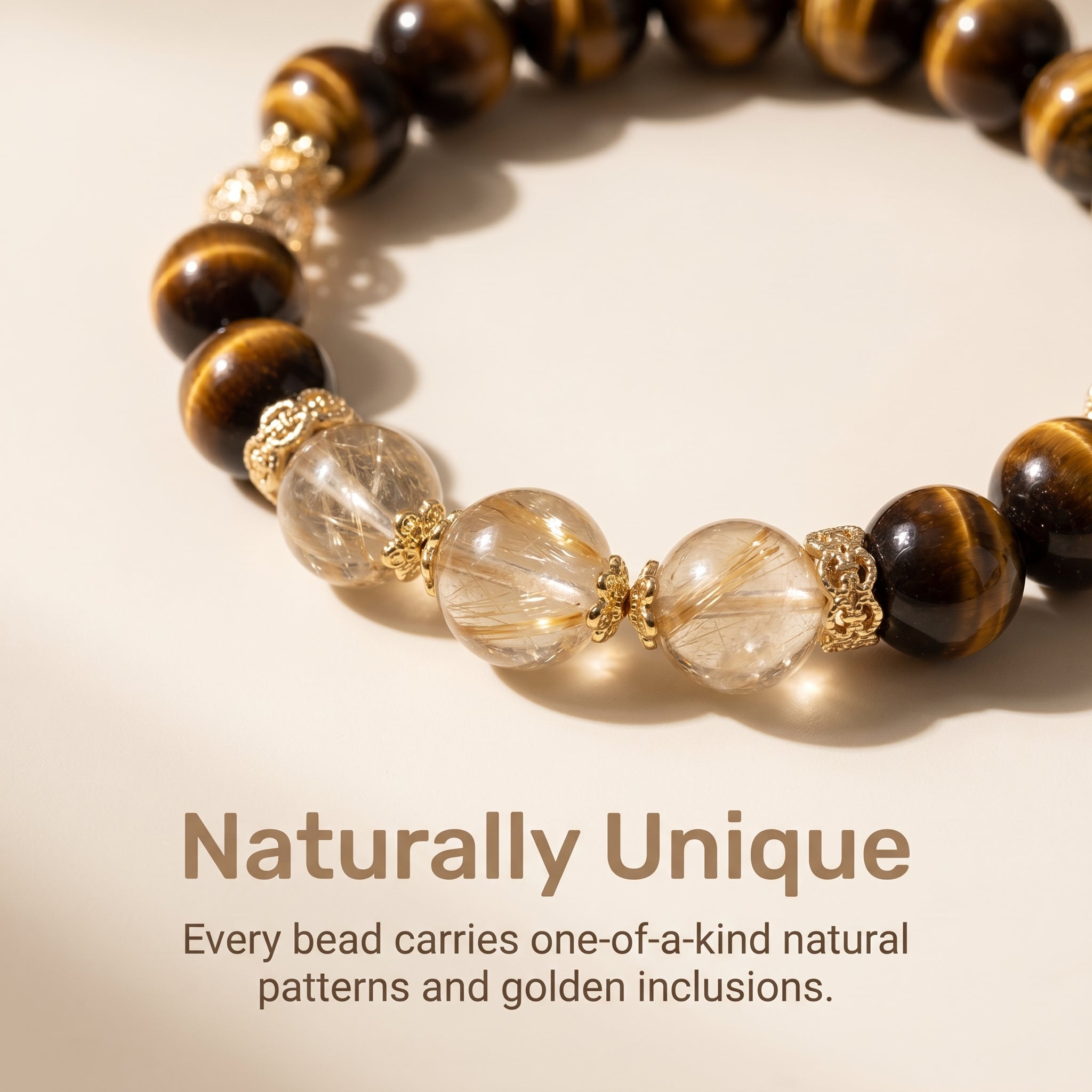 Close-up detail of natural rutilated quartz and tiger eye gemstone beads