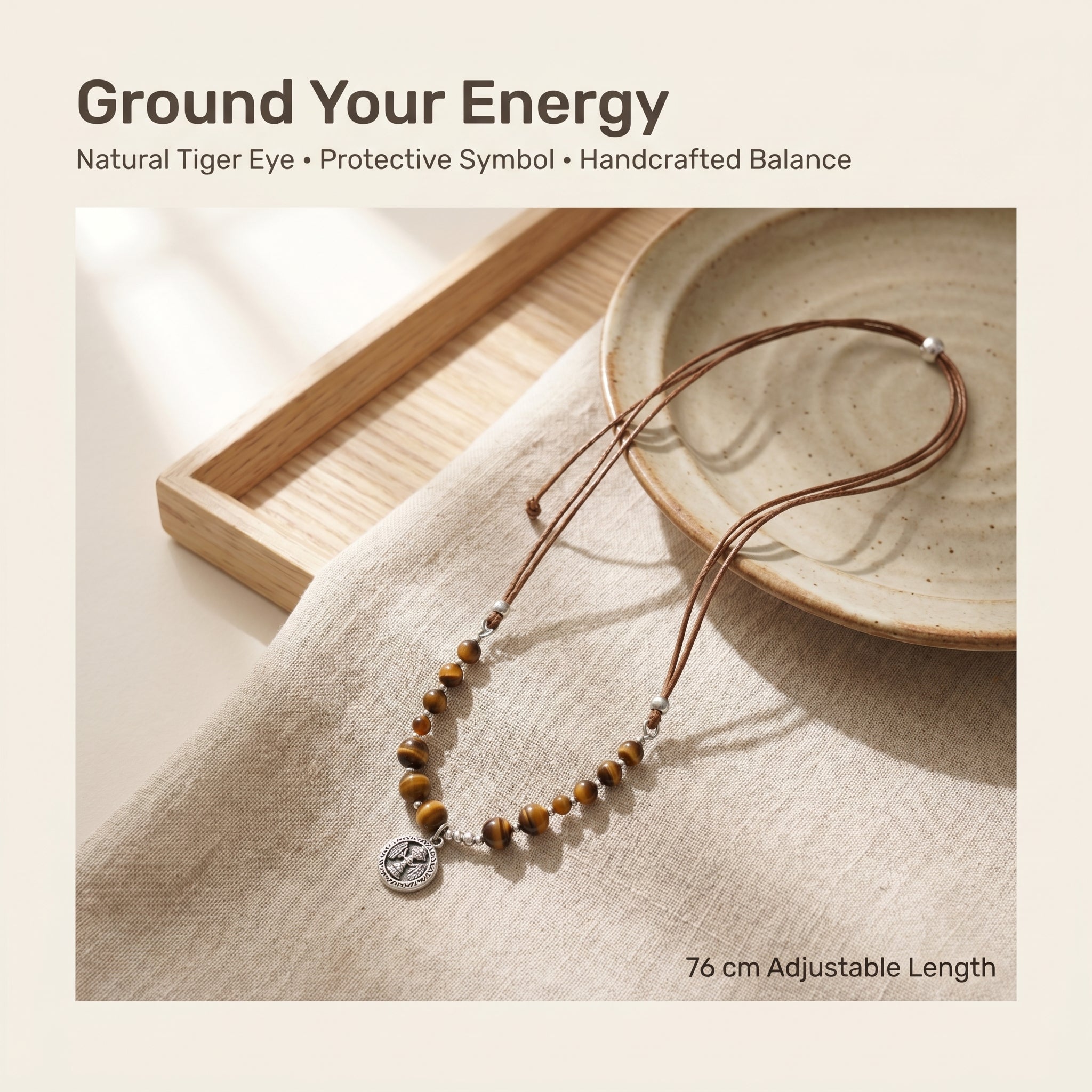 Tiger Eye crystal protection necklace styled in warm neutral lifestyle 